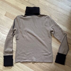 Tan Turtleneck Sweater with Black Accents